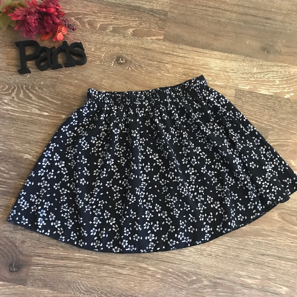 Miss Daisy elastic waistband blue floral skirt.